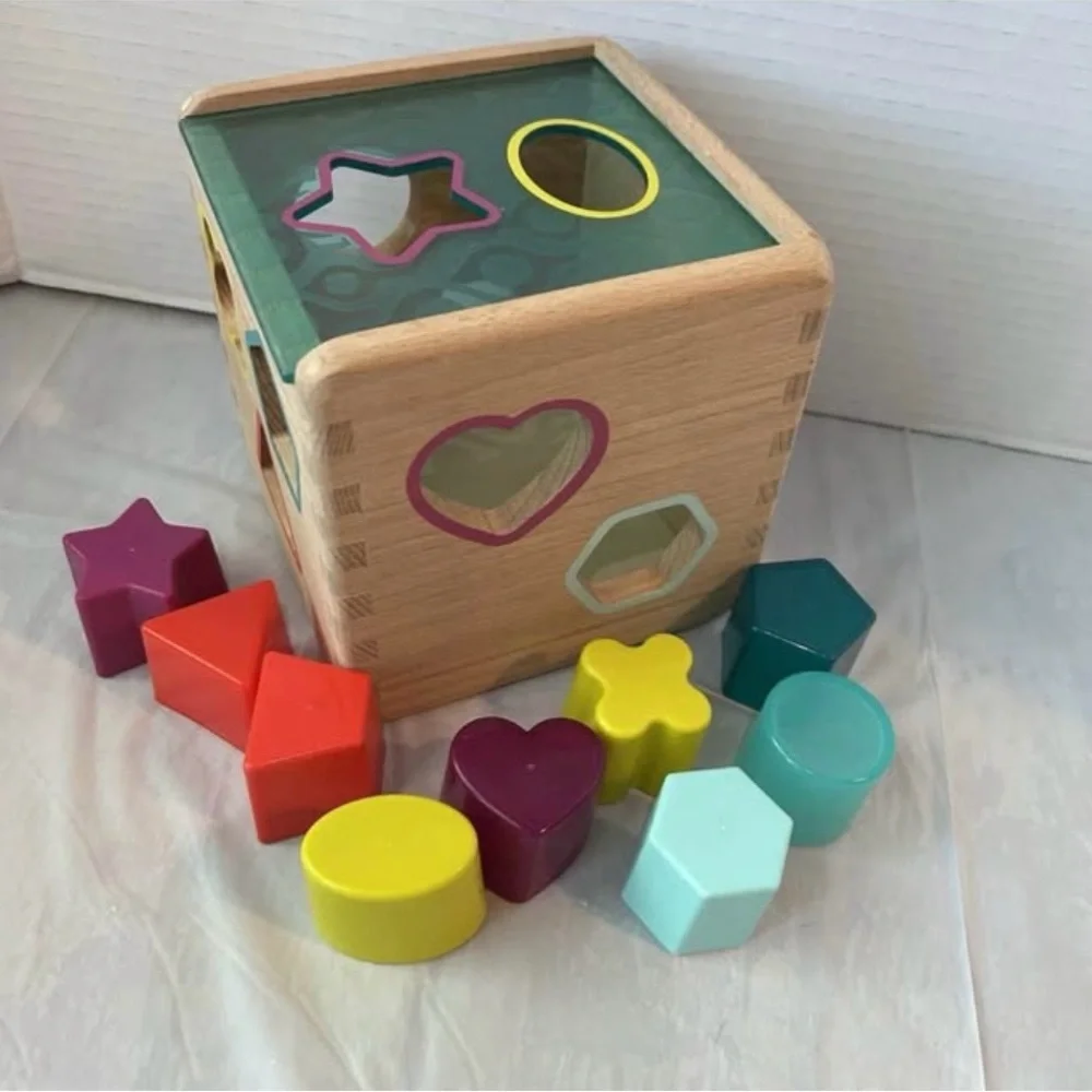 B. Toys Wooden Shape Sorting Cube Toy with 9 Shapes